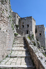Fototapeta na wymiar Klis fortress stairs and tower, Split, Croatia.