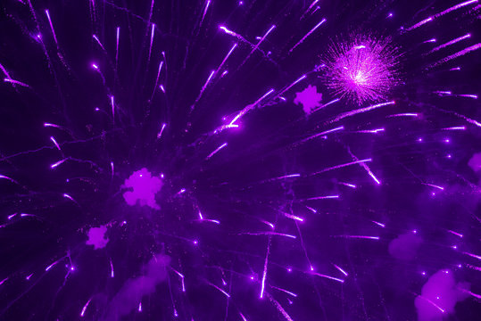 Purple Fireworks In The Night Sky. Violet Festive Firecracker. Beautiful Background