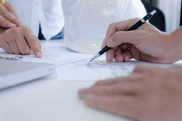 Colleagues interior designer Corporate Achievement Planning Design on blueprint Teamwork Concept with compasse.