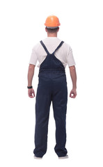 rear view. a man in a work suit looking at a copy of the space