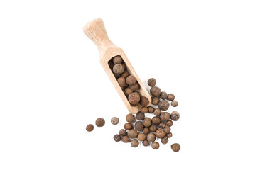 allspice jamaican pepper in wooden scoop isolated on white background. top view. spices and food ingredients.