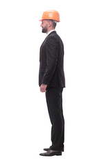 in full growth. successful businessman in a protective helmet