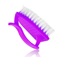 Purple household brush on a white background. Tools for cleaning the house.