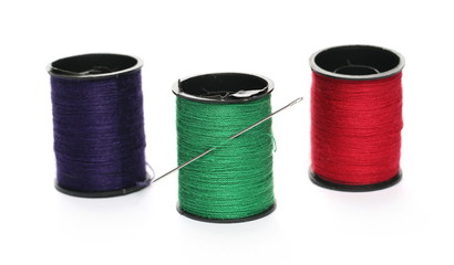 Sewing thread spools isolated on white background