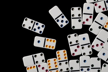 White dominoes, pieces isolated on black background, top view