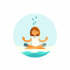 Woman in lotus position by the seaside.