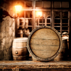 Desk of free space and wooden old barrel 