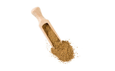 Ground or milled Caraway in wooden scoop isolated on white background. top view. spices and food ingredients.
