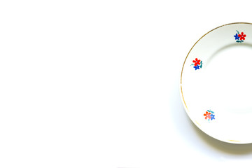 simple old fashioned vintage plate on a white background with designer offset