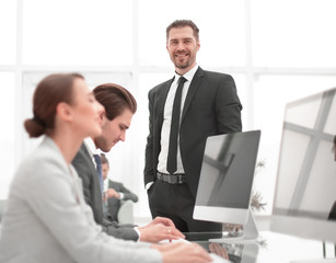 businessman standing in his office