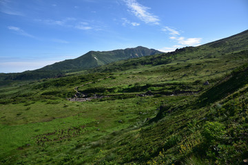 Naklejka na ściany i meble 日本の北海道の最高峰である旭岳