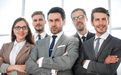 Mixed group of business men and women