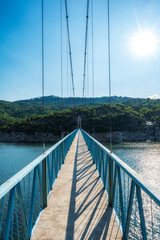 Fototapeta premium Suspension bridge over Kardzhali dam, Bulgaria near Suhovo village