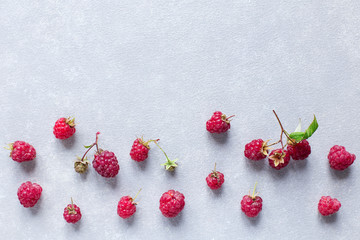 grey concrete background with raspberry, minimalism