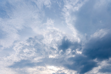 Fototapeta premium Air and fluffy clouds in the blue sky on a sunny day, background texture