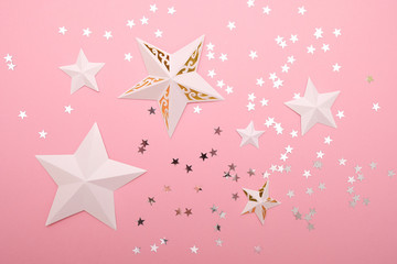Stars cut from paper with sequins in the star shape