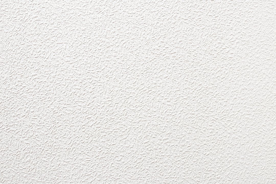 Abstract white grunge cement wall texture background. Textural white background for design.