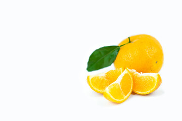 Orange fruits with leaf on isolated white background.