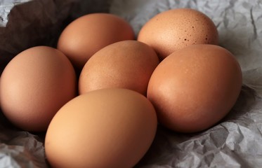 Close-up of brown/organic eggs