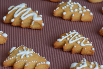 New Year's party ideas for kids. Christmas snack, cookies in shape of trees. Christmas homemade ginger cookies