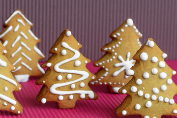 New Year's party ideas for kids. Christmas snack, cookies in shape of trees. Christmas homemade ginger cookies