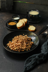 buckwheat porridge with mushrooms. food background. top view. copy space