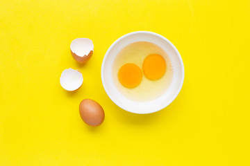 Obraz na płótnie Canvas Eggs on yellow background.