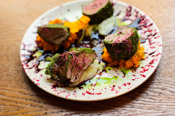 Beautiful served food on plates in restaurant