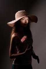 portrait of pretty woman in pink hat