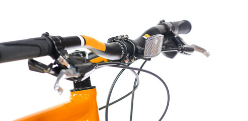 Parts of yellow bicycle on a studio white background. Close up details
