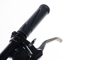 Parts of yellow bicycle on a studio white background. Close up details