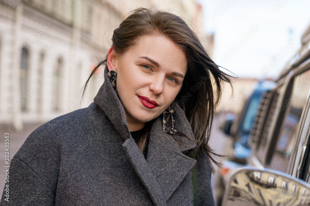 Canvas Prints portrait of beautiful happy woman in coat outside smiling