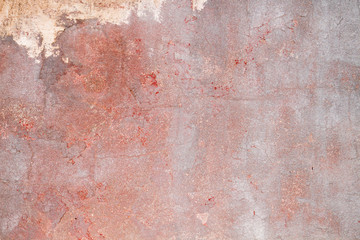 Old weathered red wall background or texture