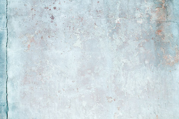 Old distressed blue wall background or texture