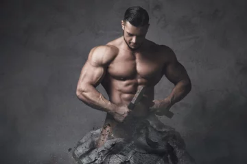 Foto op Plexiglas  Bodybuilder made himself from the piece of stone. Concept of self improvement and bodybuilding progress. © blackday