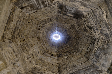 Unusual view looking straight up inside the kitchen chimney stack at the Palais des Papes, Avignon, France