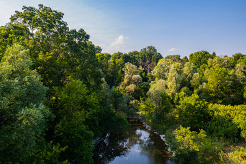 park at Markham Ontario Canada with bridge, river, and trees