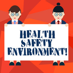 Word writing text Health Safety Environment. Business concept for Environmental protection and safety at work Male and Female in Uniform Standing Holding Blank Placard Banner Text Space