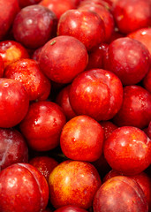 Fototapeta na wymiar Fresh red plums