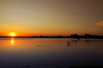 Sunset in Waren (with skyline) on Müritz lake, Mecklenburg Lake Plateau, Germany