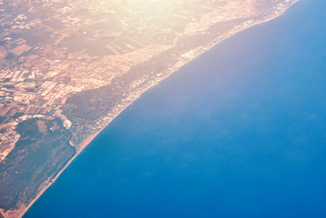 Aerial view of a sea coast and city