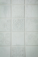 decorative tiled wall with space for text 