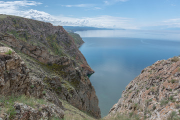 Fototapeta na wymiar Beautiful view of Lake Baikal on a clear summer day from the shore of Olkhon Island