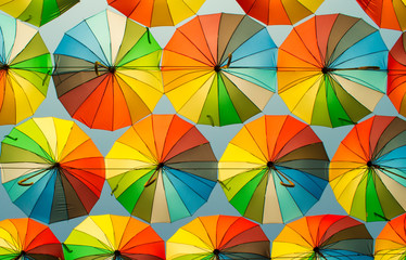 Fototapeta na wymiar colorful umbrellas texture bottom view