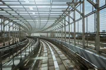 tunnel of monorail road view from front window of a moving train running
