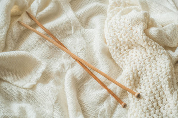 Thread for knitting in a basket closeup. Knitting as a hobby. Accessories for knitting.