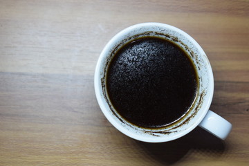 A Cup Of Coffee at Wooden Table Texture