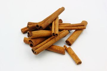 cinnamon sticks on white background