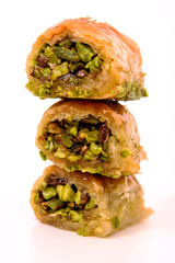 Baklava with pistachio on a white background