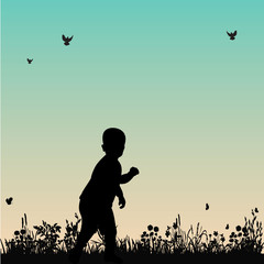 against the background of nature, silhouette of a child of a boy
